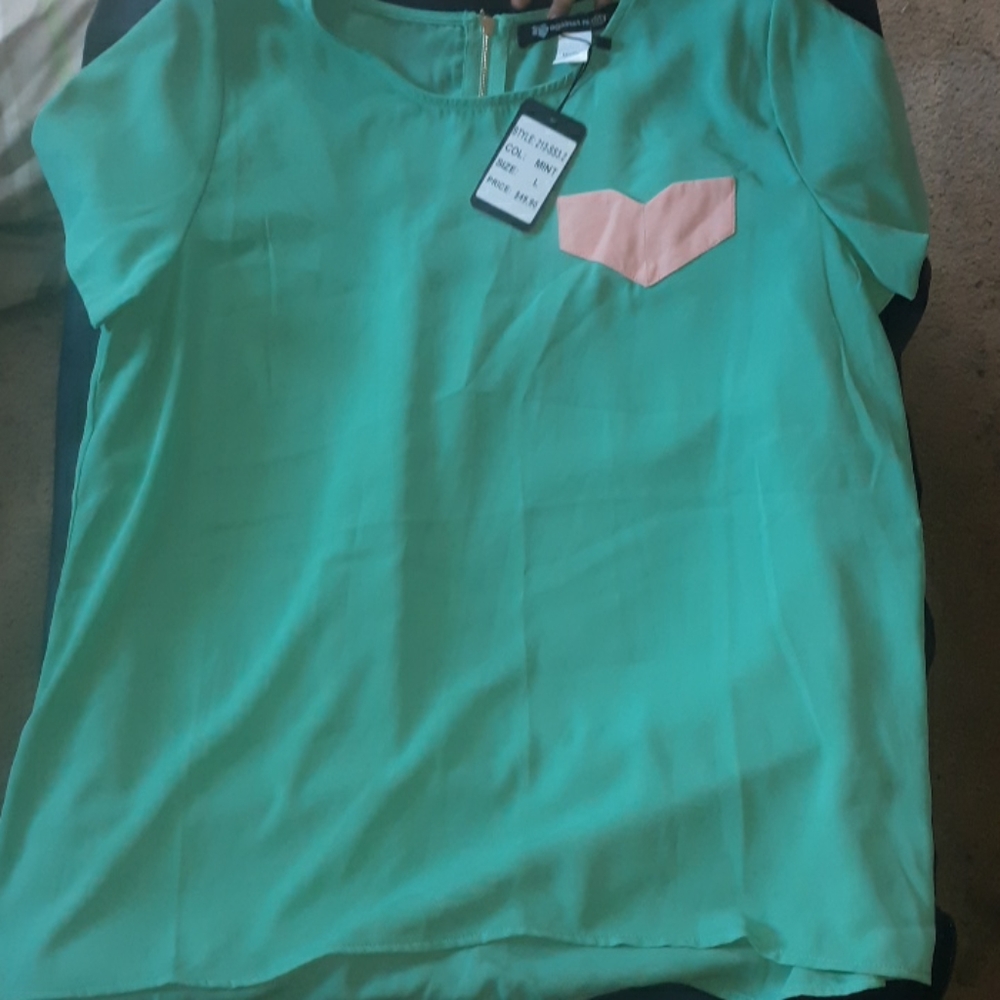 Mint green blouse size large